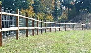 medinė tvora iš medinių kuolų